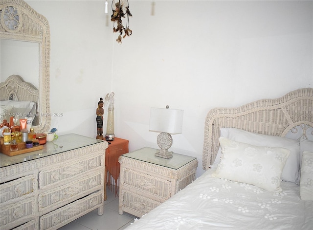 bedroom featuring tile patterned flooring