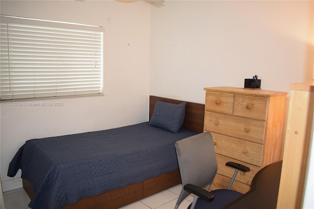 bedroom featuring light tile patterned floors