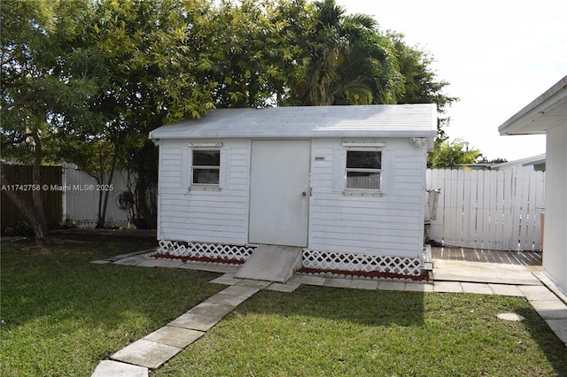 view of shed with a fenced backyard