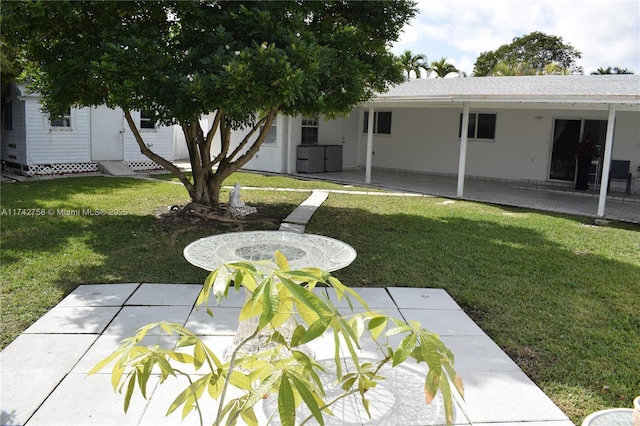 view of yard with a patio area