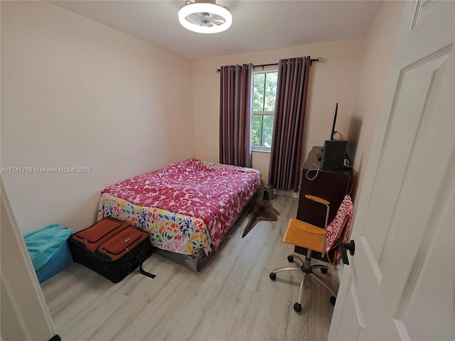 bedroom featuring hardwood / wood-style flooring