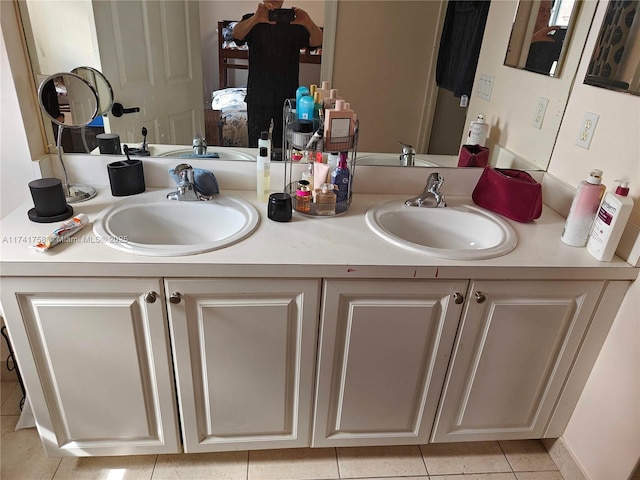 bathroom featuring vanity and tile patterned flooring