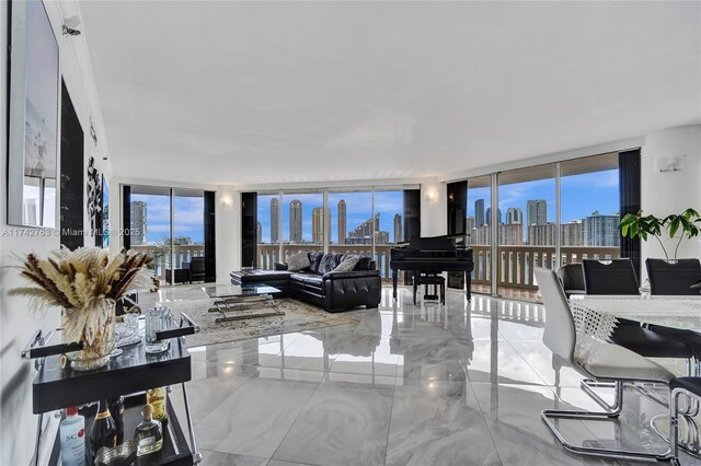 living room with floor to ceiling windows