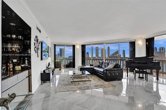 living room featuring bar, ornamental molding, and floor to ceiling windows