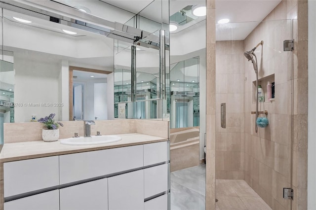 bathroom with vanity and an enclosed shower