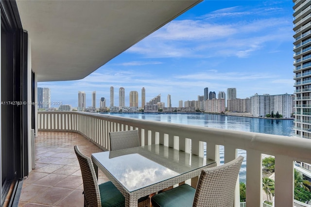 balcony featuring a water view