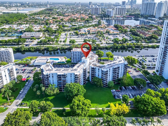 birds eye view of property featuring a water view