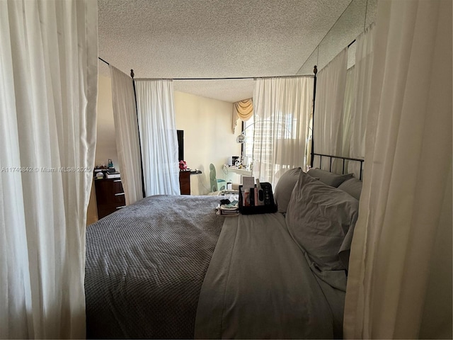 bedroom with a textured ceiling