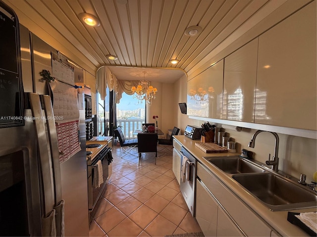 kitchen featuring sink, light tile patterned floors, wooden ceiling, appliances with stainless steel finishes, and pendant lighting