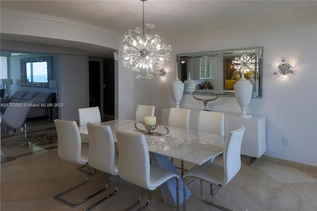 dining space with an inviting chandelier and crown molding