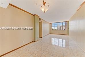 empty room featuring light tile patterned floors