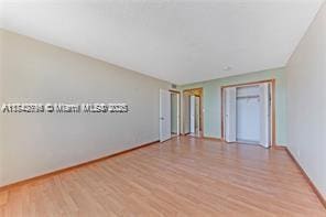 empty room featuring light wood-type flooring