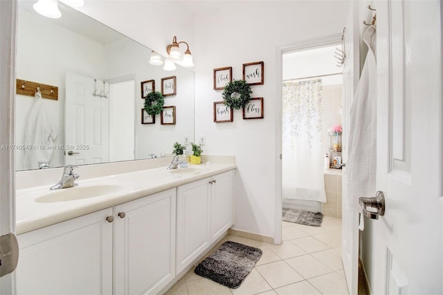 bathroom with vanity, shower / tub combo, and tile patterned floors