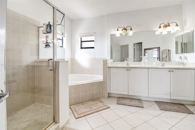 bathroom with vanity, separate shower and tub, and tile patterned floors