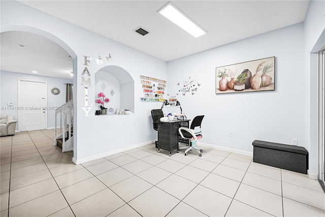 office area featuring light tile patterned flooring