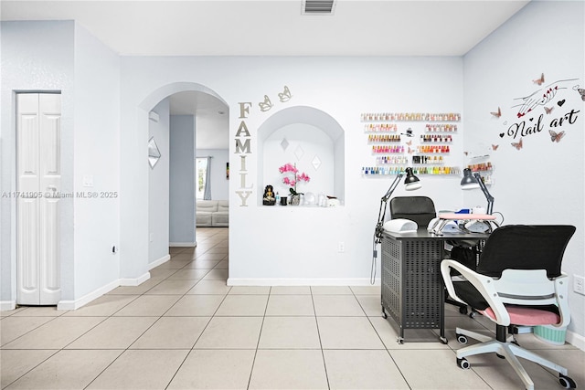 home office featuring light tile patterned floors