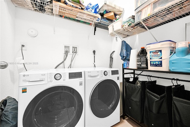 laundry room with separate washer and dryer