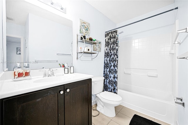 full bathroom featuring vanity, shower / tub combo, tile patterned floors, and toilet