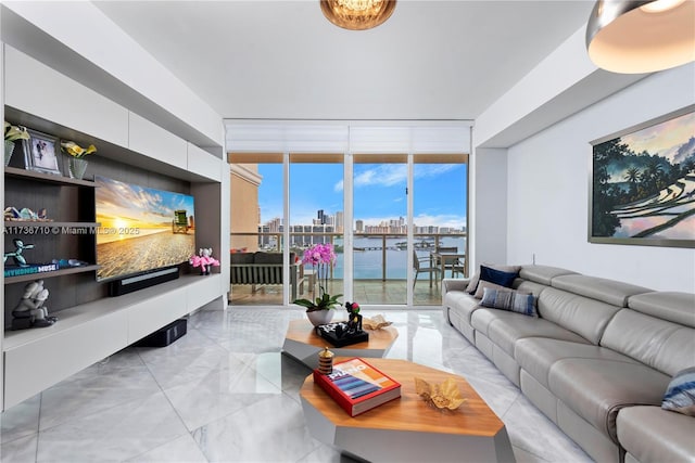 3330 NE 190th St Unit 1715, Aventura, FL 33180 - living area with a wall of windows and light marble finish flooring