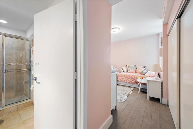 3330 NE 190th St Unit 1715, Aventura, FL 33180 - hallway featuring baseboards, wood finished floors, and recessed lighting