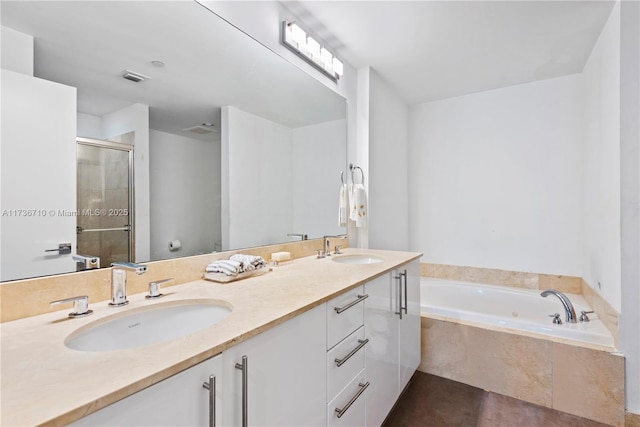 3330 NE 190th St Unit 1715, Aventura, FL 33180 - bathroom featuring a stall shower, double vanity, and a garden tub