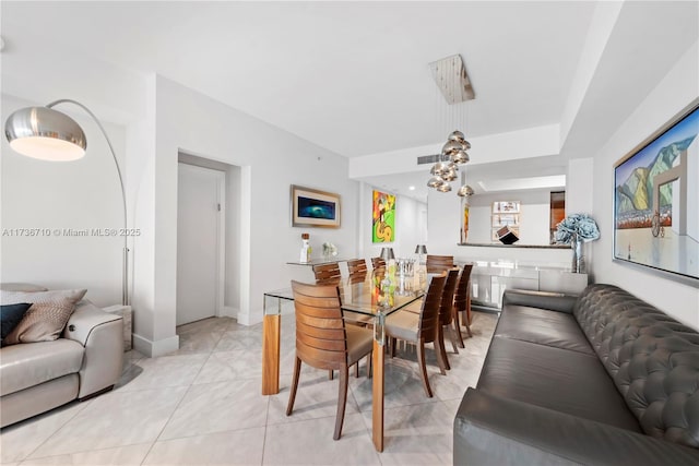 3330 NE 190th St Unit 1715, Aventura, FL 33180 - dining space with baseboards and light tile patterned flooring