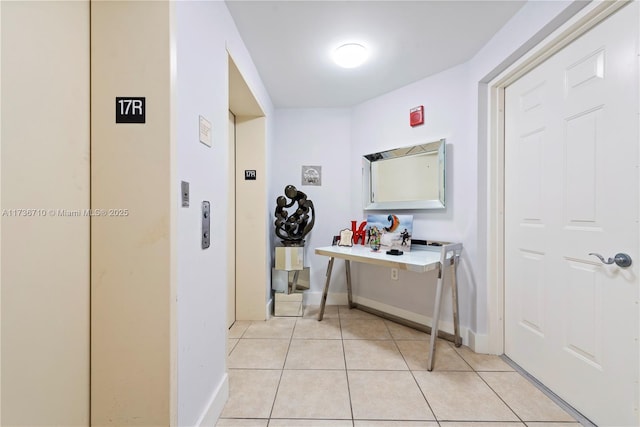3330 NE 190th St Unit 1715, Aventura, FL 33180 - hall featuring light tile patterned flooring and baseboards