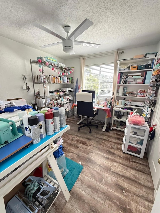 office space with hardwood / wood-style floors, a textured ceiling, and ceiling fan