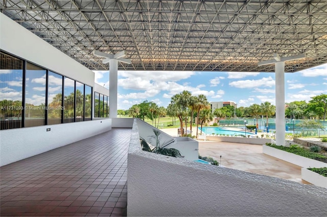 view of patio / terrace featuring a community pool