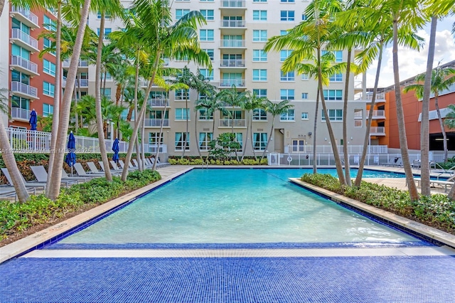 view of swimming pool with a patio