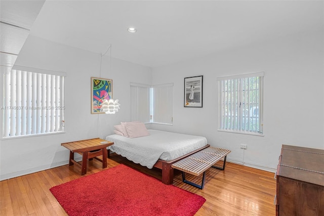 bedroom featuring hardwood / wood-style floors