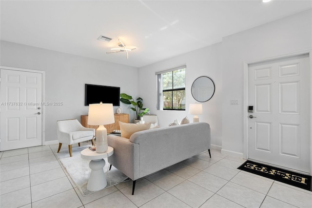 living room with light tile patterned floors