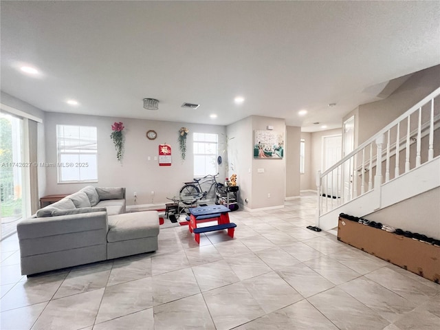 6411 Osprey Landing St, Davie, FL 33314 - living room featuring visible vents, stairs, baseboards, recessed lighting, and light tile patterned flooring