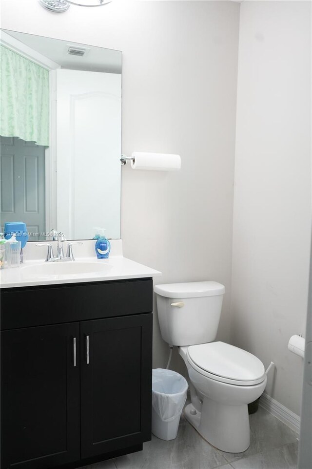 6411 Osprey Landing St, Davie, FL 33314 - half bathroom with toilet, baseboards, visible vents, and vanity