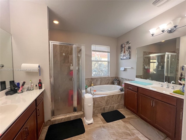 6411 Osprey Landing St, Davie, FL 33314 - full bath with a garden tub, a sink, a stall shower, and two vanities