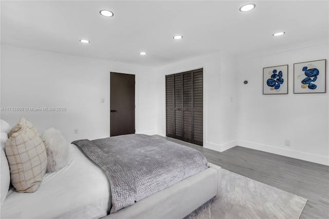 bedroom featuring hardwood / wood-style flooring