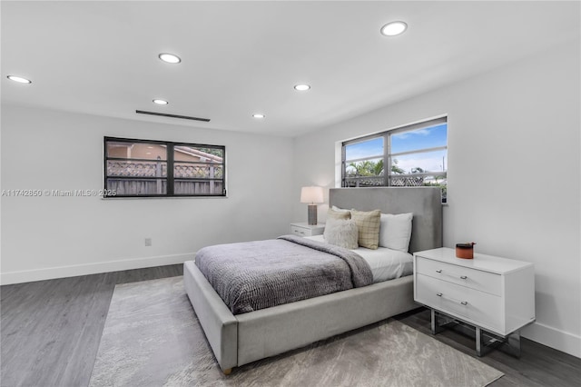 bedroom featuring dark hardwood / wood-style floors