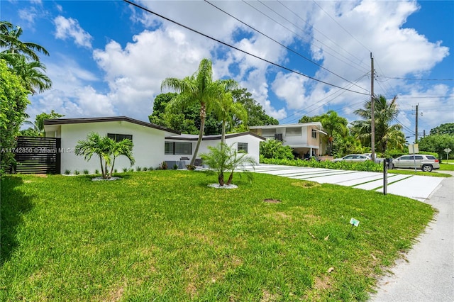 view of front of home with a front yard