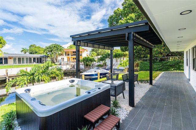 view of patio with a hot tub