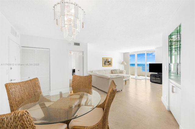 3180 S Ocean Dr Unit 511, Hallandale Beach, FL 33009 - dining area with a chandelier