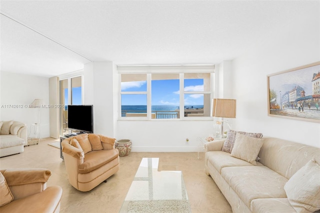 living room featuring a textured ceiling