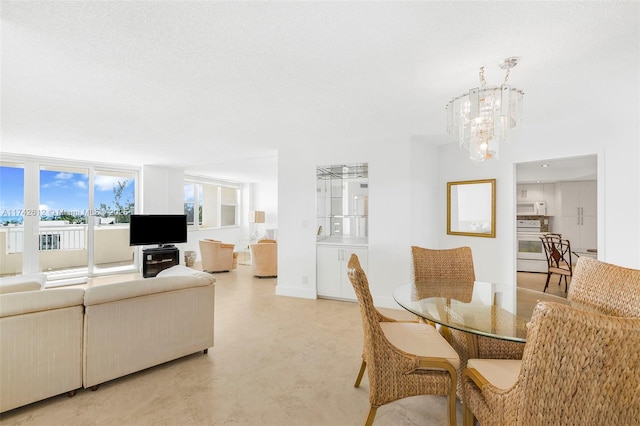 dining area featuring a chandelier