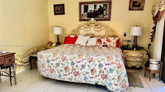481 Ives Dairy Rd Unit 301-4, Miami, FL 33179 - bedroom with light tile patterned floors