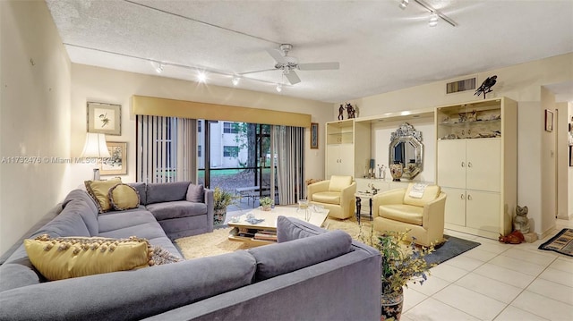 481 Ives Dairy Rd Unit 105-4, Miami, FL 33179 - living room featuring track lighting, ceiling fan, light tile patterned floors, and visible vents