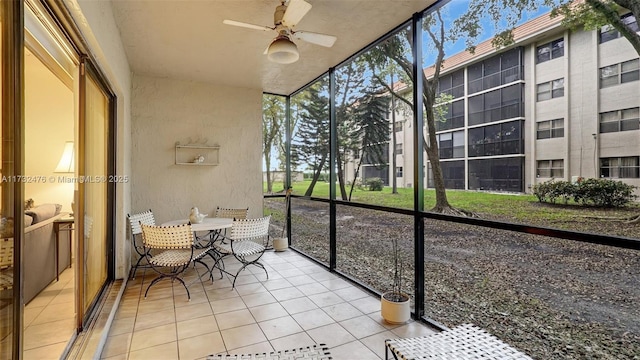 481 Ives Dairy Rd Unit 105-4, Miami, FL 33179 - sunroom with a ceiling fan and a wealth of natural light