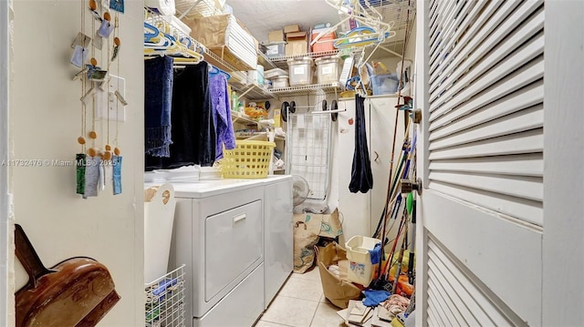 481 Ives Dairy Rd Unit 105-4, Miami, FL 33179 - laundry area featuring laundry area, washer and clothes dryer, and light tile patterned flooring