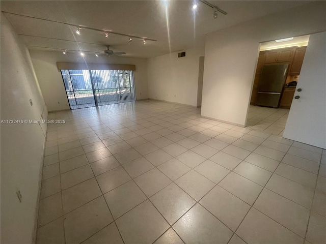481 Ives Dairy Rd Unit 105-4, Miami, FL 33179 - unfurnished room with a ceiling fan, visible vents, track lighting, and light tile patterned floors