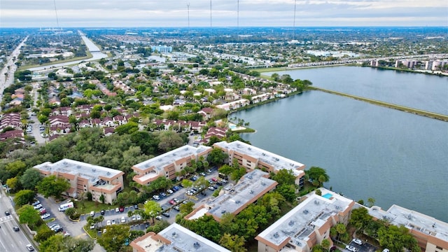 drone / aerial view with a water view