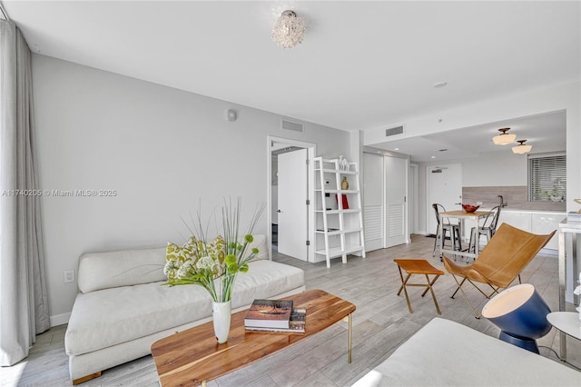 living room featuring light hardwood / wood-style floors