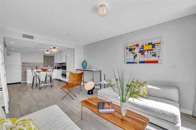 living room with light wood-type flooring